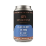 A 12 oz can of Spring Branch Kombucha featuring the Blueberry Thyme flavor. The can has a soothing blue and black design with copper accents, showcasing the brand logo and flavor name.